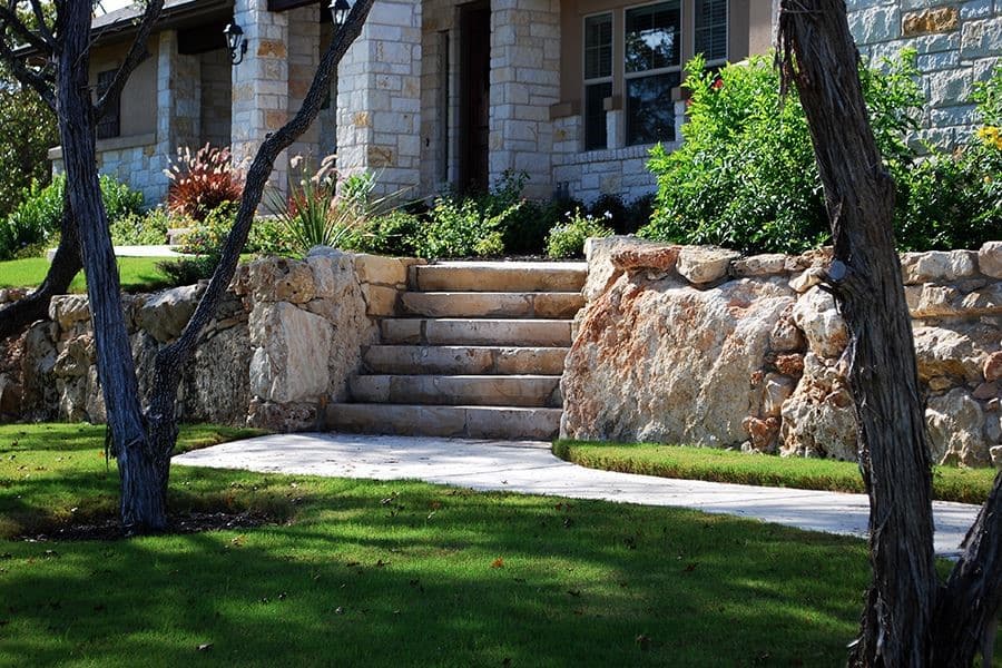 Hardscape retaining wall with stairs and pathway