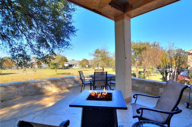 Covered rock patio with fire pit