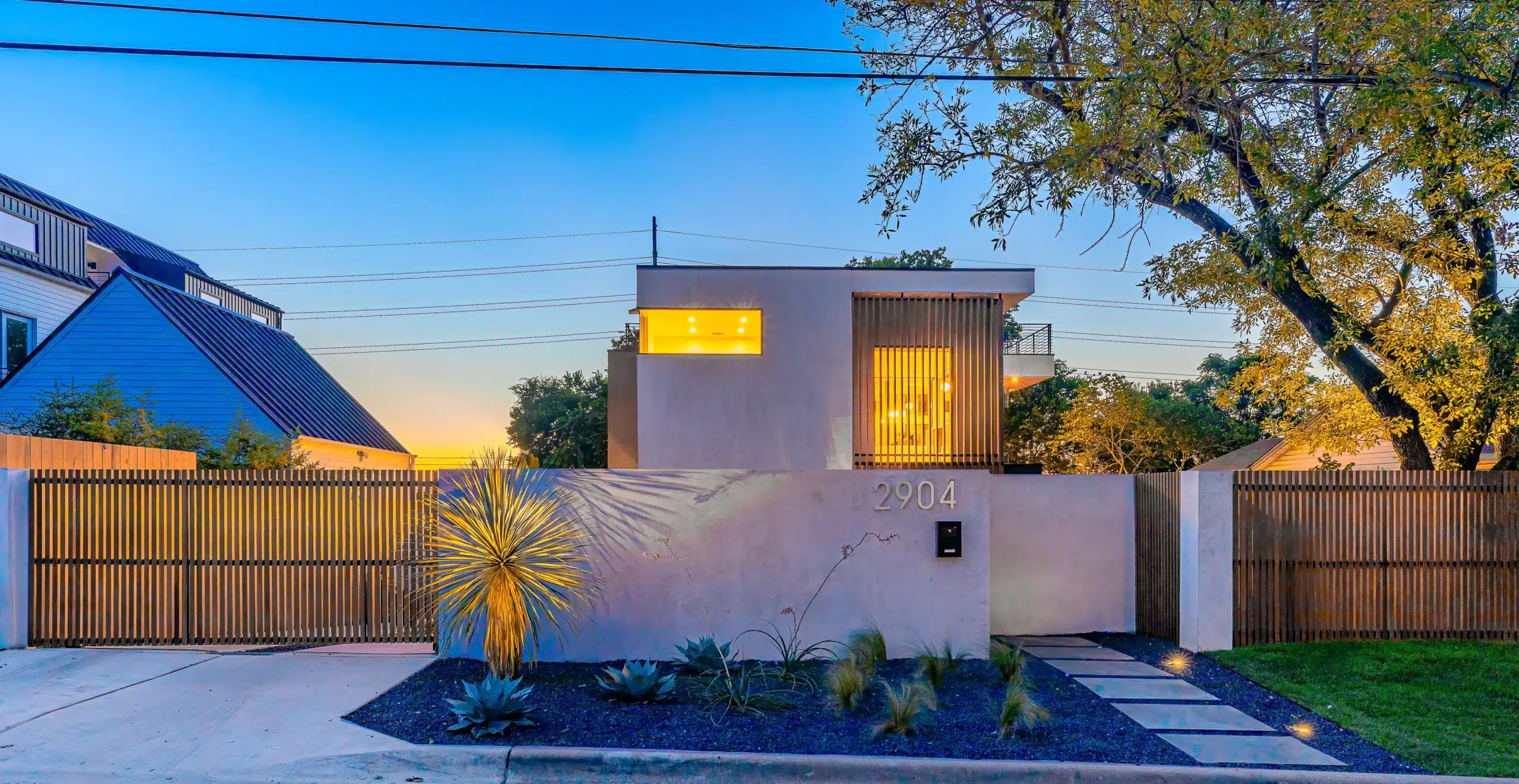 modern home with xeriscape front yard by Austin landscape designer