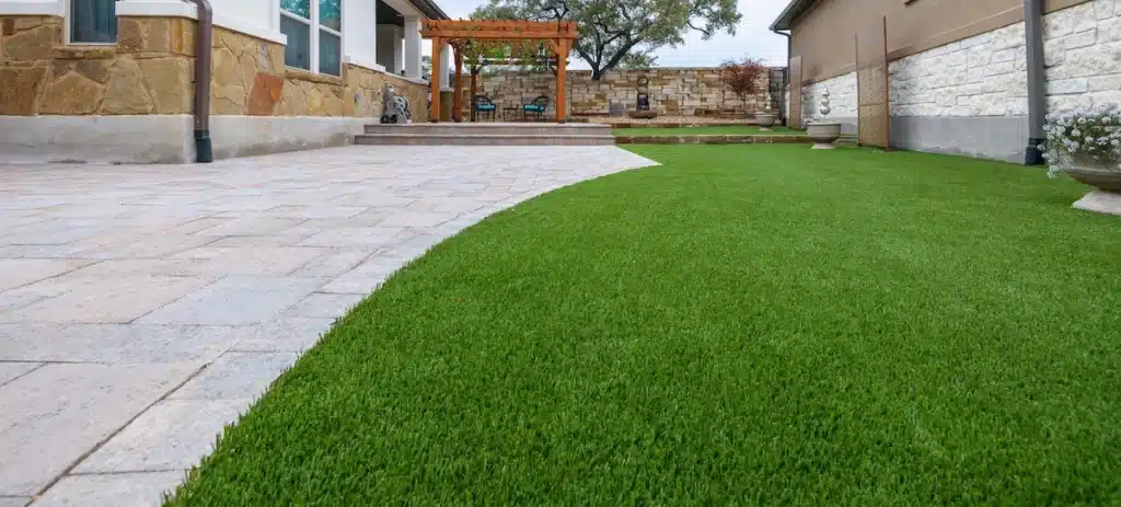 lawn installation for backyard landscape design with pergola and lawn decor in Georgetown, Texas