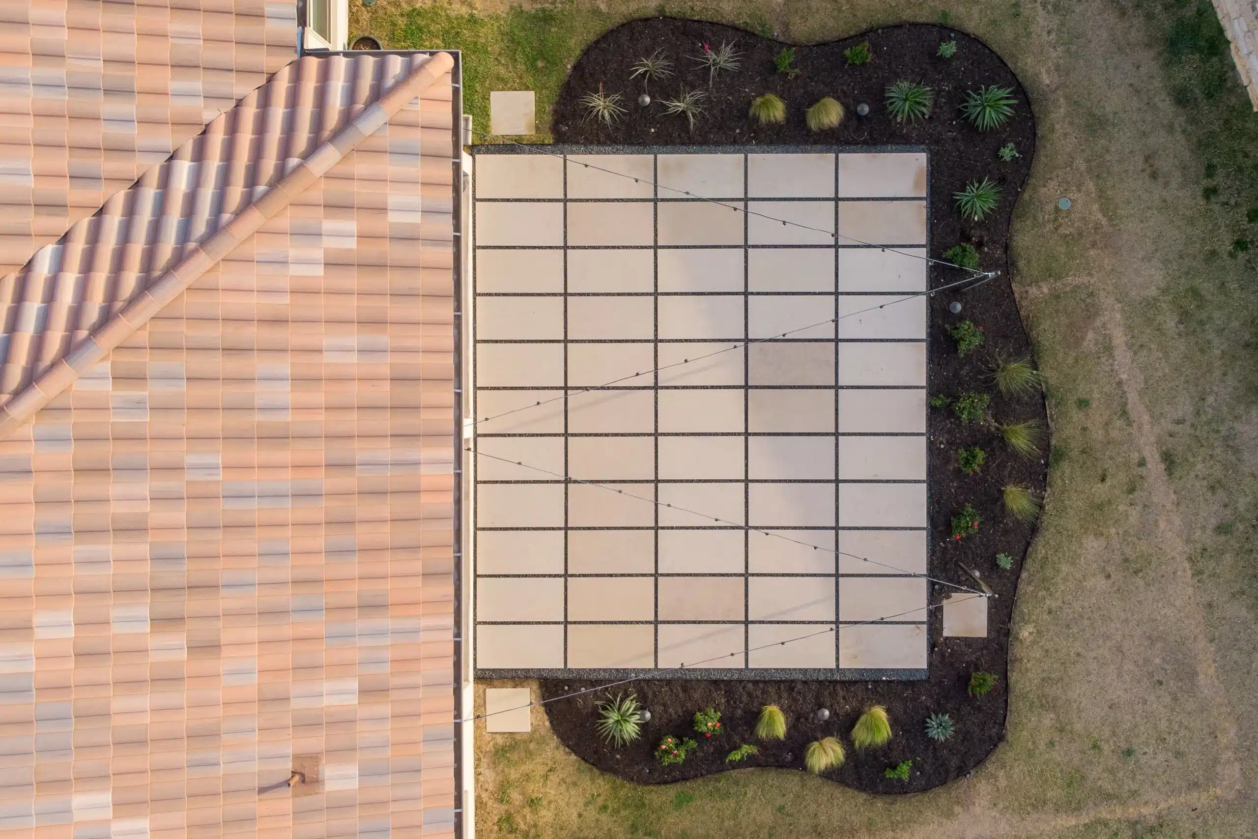 aerial shot of backyard patio extension off Ibaza Bend in Leander by Best of Texas Landscapes